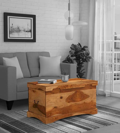 Titus rattan storage cabinet featured in an architectural home